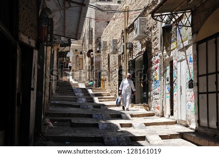 JERUSALEM - JULY 28: Muslim Arab man at Jerusalem old city Muslim Quarter on July 28 2009.Jerusalem is a holy city to the three major Abrahamic religions - ?Judaism, Christianity and Islam.