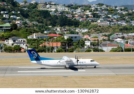 WELLINGTON - FEB  23:Air New Zealand plane lands in Wellington International Airport on Feb 23 2013.It\'s the third-busiest airport in NZ handling about 5 million passengers a year.