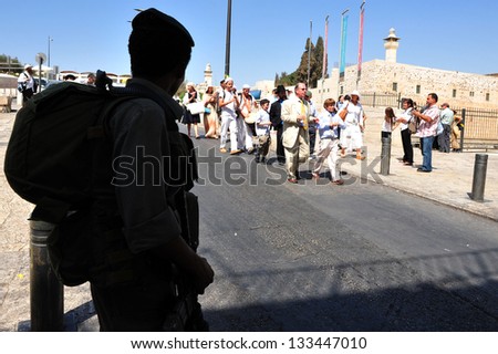 JERUSALEM -SEP 22: Bar Mitzvah ritual at the Wailing wall on September 22 2008 in Jerusalem, Israel.Boy who has become a Bar Mitzvah is morally and ethically responsible for his decisions and actions.