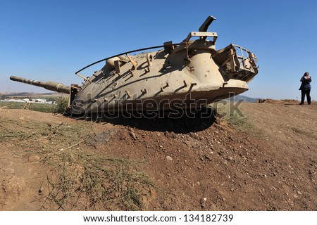 GOLAN HEIGHTS - AUG 23:A destroyed Syrian tank on August 23 2009 in G.H Israel. Syria tried to regain the plateau in 1973 war but failed since 1974 armistice the Golan has been relatively quiet.