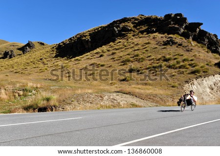 WANAKA, NZ - MAR 02:Biker ride Recumbent bicycle on Mar 02 2009 Wanaka, NZ.It holds the world speed record for a bicycle and now race under the banner of the Human Powered Vehicle Association (HPVA).