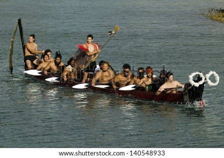 TAIPA,NZ - MAY 18:Maori War Waka on May 18 2013. Waka taua (war canoes) are large canoes manned by up to 80 paddlers and are up to 40 meters (130 ft) in length.