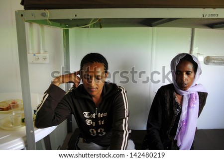 KETZIOT, ISR - JULY 17:Sudanese refugees women in Ktziot refugee detention centre on July 17 2007.There are currently an estimated 60,000 African migrants in Israel.