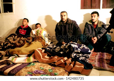 ASHDOD,ISR - FEB 23:Illegal Palestinian workers capture during Israeli border patrol police raid on Feb 23 2006.About 40,000 undocumented Palestinian workers enter illegally to Israel each year.