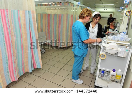 ASHKELON, ISR - JULY 14:Madical staff on duty in Barzilai medical center emergency department on JULY 14 2011. The emergency departments of most hospitals in the world operate 24 hours a day.