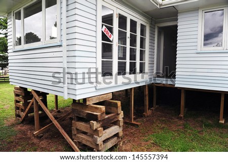 WHANGAREI, NZ - FEB 20:House without foundations on Feb 20 2009.Structure relocation is a process to separate a building from the plot of land that it stands on or to preserve an historic building.