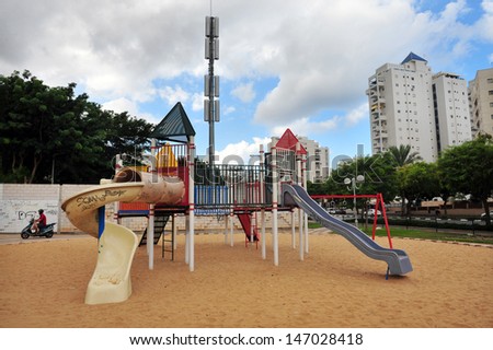 ASHDOD, ISR - SEP 14:Cellular tower in playground on Sep 14 2010.Studies have found that levels of radiation emitted from cell phone towers can damage cell tissues, DNA and other health problems.
