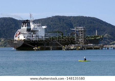 WHANGAREI,NZ - JULY 28:Tanker unloading at Marsden Point Oil Refinery on July 28 2013.It\'s produces 70% of NZ refined oil needs, with the rest being imported from Singapore, Australia and South Korea