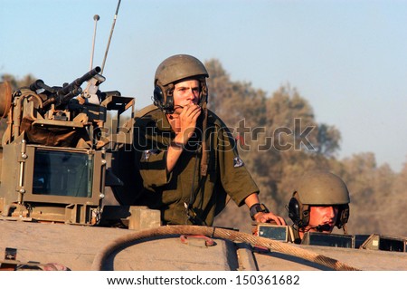 NACHAL OZ, ISR - JULY 01:Israeli soldiers in armed vehicle on July 01 2006.IDF is one of Israeli society\'s most prominent institutions, influencing the country\'s economy, culture and political scene.