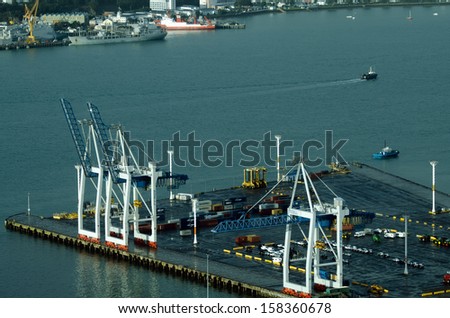 AUCKLAND,NZ - OCT 08:Container cranes on Bledisloe Wharf at Ports of Auckland on Oct 08 2013.It\'s New Zealand\'s largest commercial port, its turnover of more than NZ$20 billion per year