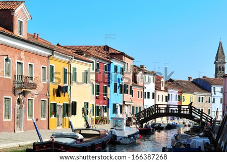 BURANO ISLAND, ITALY - MAY 01:Colorfully painted houses on Burano island on May 01 2011.Burano Island is known for its small, colorful brightly painted houses, popular with Italian artists.