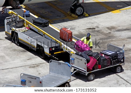 AUCKLNAD - DEC 31:Air transport luggage in Auckland International Airport on Dec 31 2013.Unaccompanied luggage led to downing of two flights when a bomb inside the suitcase exploded in 1985 and 1988.