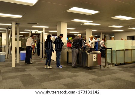 AUCKLAND - DEC 31:Airport security station on Dec 31 2013.Since the 1970s, Air Terrorism, hijackings and bombings became the method of choice for subversive, militant organizations around the world.