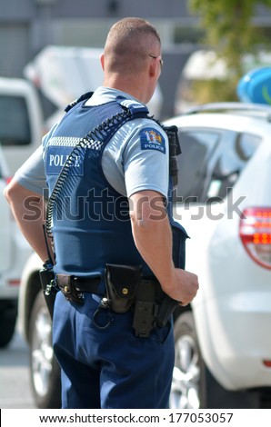 QUEENSTOWN, NZ - JAN 18:NZ Policeman on duty on Jan 18 2014. With over 11,000 staff it is the largest law enforcement agency in New Zealand