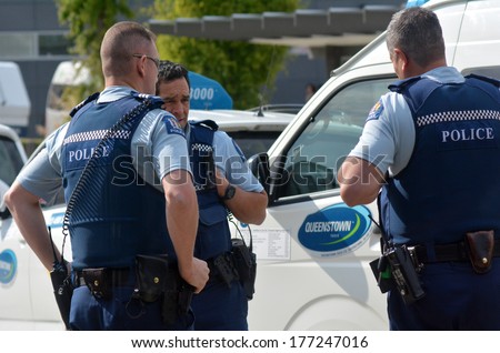 QUEENSTOWN, NZ - JAN 18:NZ Policemen on duty on Jan 18 2014. With over 11,000 staff it is the largest law enforcement agency in New Zealand