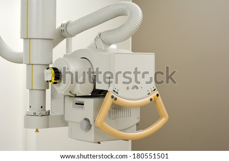 X-ray generator device in radiology room. Concept photo of health and medical care.