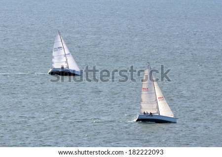DOUBTLESS BAY, NZ - MAR 12:Two sailing boats during yacht club racing on Mar 12 2014.New Zealand is one of the top sailing nation in the world.