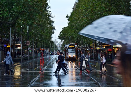 MELBOURNE, AUS - APR 11 2014:Traffic on Swanston Street.Since the 90s Melbourne have population and employment growth with international investment in the city\'s industries and property market.