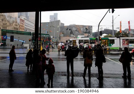 MELBOURNE, AUS - APR 10 2014:Traffic on Swanston Street and Federation Square.Melbourne is the capital and most populous city in the state of Victoria and the second most populous city in Australia.
