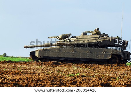 NIR AM, ISR - DEC 28:Israeli tank during the final preparation of the IDF for a possible land incursion into Gaza strip  during cast lead operation on December 31, 2008.