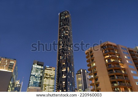 BRISBANE, AUS - SEP 25 2014: Infinity Tower, Brisbane at night. The Infinity Tower is a 249-metre (817 ft) skyscraper by Meriton. Infinity Tower is the tallest building in Brisbane today.