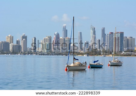 GOLD COAST - SEP 27 2014:Yachts mooring under Surfers Paradise Skyline.It one of Australia\'s iconic coastal tourist destinations, drawing about 10 million tourists every year from all over the world.