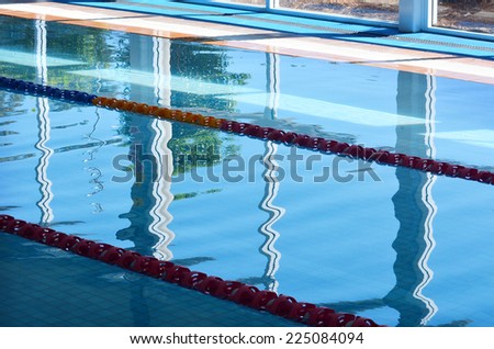 Indoor swimming pool. Background texture. concept photo water, sport, swimming.
