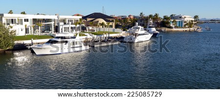 GOLD COAST - OCT 14 2014:Luxury homes and super yachts in Sovereign Islands.It\'s one of the most expensive areas in Gold Coast Queensland and Australia with some homes in excess of 20 million dollars.