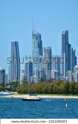 GOLD COAST - OCT 23 2014:Yacht mooring under Surfers Paradise Skyline.It one of Australia\'s iconic coastal tourist destinations, drawing about 10 million tourists every year from all over the world.