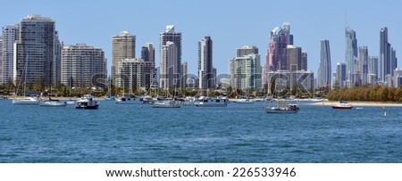 GOLD COAST - OCT 23 2014:Yachts mooring under Surfers Paradise Skyline.It one of Australia\'s iconic coastal tourist destinations, drawing about 10 million tourists every year from all over the world.