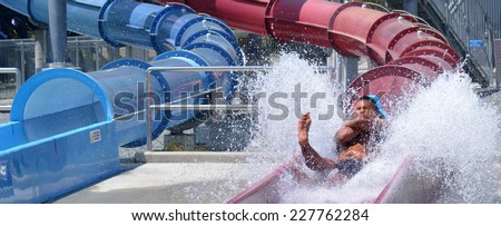 GOLD COAST, AUS - OCT 30 2014:Visitors in Wet\'n\'Wild Gold Coast water park. In 2009, the park received 1,095,000 visitors ranking it first in Australia and eighth in the world