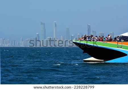 SURFERS PARADISE, AUS - OCT 29 2014:Visitors during a Whale Watching Cruise.More than 20,000 whales pass the Coast during the migration season every year.