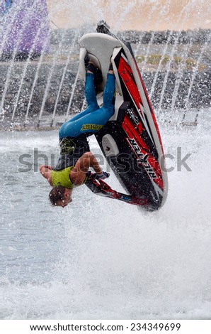 GOLD COAST, AUS -  NOV 06 2014:Jet Ski Show in Sea World Gold Coast Queensland Australia.The show is produced by Jon Cooke Entertainment and features some of the world\'s best jet ski performers.