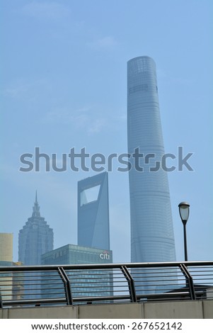 SHANGHAI, CN - MAR 15 2015:Shanghai Tower (right) in Pudong Shanghai,China. Shanghai Tower is currently the tallest building in China and the 2st tallest in the world, surpassed by Burj Khalifa, Dubai
