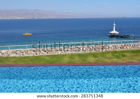 EILAT, ISR - APRIL 14 2015:Coral 2000 boat in Coral Beach Nature Reserve in Eilat, Israel.It\'s one of the most beautiful coral reef in the world and it is visited by travelers from all over the world.