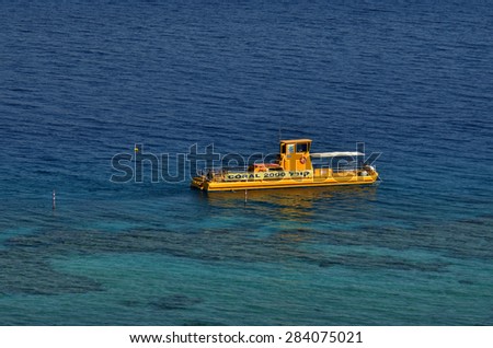 EILAT, ISR - APRIL 14 2015:Coral 2000 boat in Coral Beach Nature Reserve in Eilat, Israel.It\'s one of the most beautiful coral reef in the world and it is visited by travelers from all over the world.