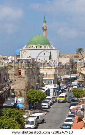 ACRE, ISRAEL - APR 21 2015:Jezzar Pasha White Mosque, in Acre Akko old city port, Israel.The mosque is an excellent example of Ottoman architecture, which incorporated both Byzantine and Persian styles.