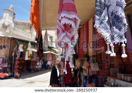 Arab keffiyeh on display in a store at the Arab market of the old city Jerusalem, Israel.