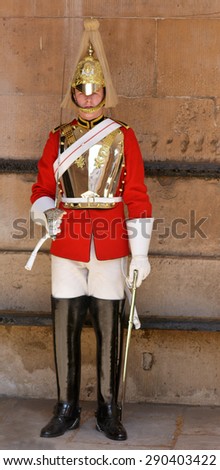 LONDON, UK - MAY 13 2015:Trooper of the Blues and Royals performing ceremonial duties at Horse Guards.The soldiers is charged with guarding the official royal residences in the United Kingdom.