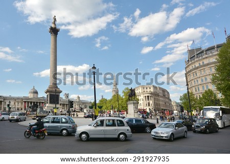 LONDON, UK - MAY 14 2015:Nelson\'s Column in Trafalgar Square London, England United Kingdom.The whole monument is 169 ft 3 in (51.6 m) tall from the bottom of the pedestal to the top of Nelson\'s hat.