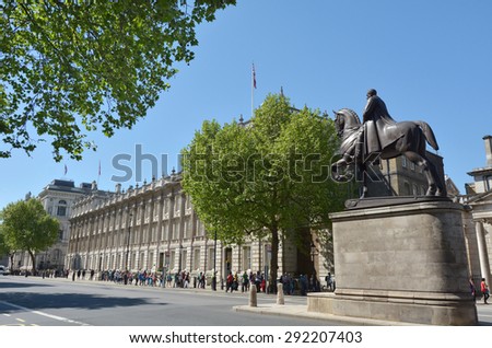 LONDON - MAY 13 2015:Whitehall road London England UK.Whitehall is home for some of Britain government buildings such as Ministry of Defence, Cabinet Office building and the Horse Guards.