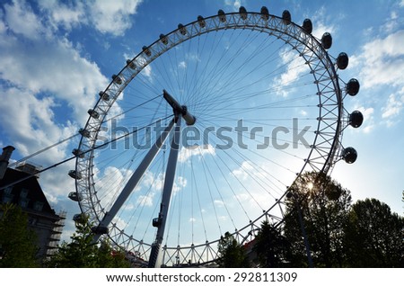 LONDON, UK - MAY 15 2015:Silhouette of London Eye in London, UK.The London Eye can carry 800 people each rotation, which is comparable to 11 London red double decker buses.