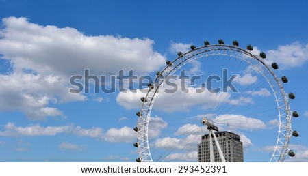 LONDON - MAY 12 2015:London Eye in London, UK.The London Eye can carry 800 people each rotation, which is comparable to 11 London red double decker buses
