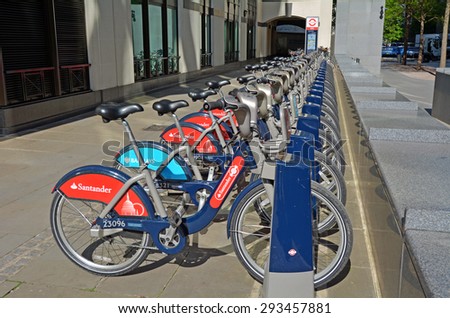 LONDON - MAY 13 2015:Santander Cycles Hire Station.London\'s public bike sharing scheme is available 24/7, 365 days a year. with more than 10,000 bikes and over 700 bike docking stations across London.