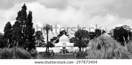 SAN FRANCISCO - MAY 21 2015:Visitors at Conservatory of Flowers It\'s a greenhouse and botanical garden that houses a collection of rare and exotic plants in Golden Gate Park, San Francisco, California