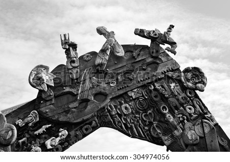 AUCKLAND - AUG 01 2015:Traditional Maori entry gate at Aotea Square.It features Maori art symbols with elements like the nuclear disarmament symbol, reflecting the modern influences on New Zealand art