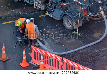 Similar – Image, Stock Photo Road worker cleaning city street with high pressure power washer, cleaning dirty public transport stops, Moscow, Russia