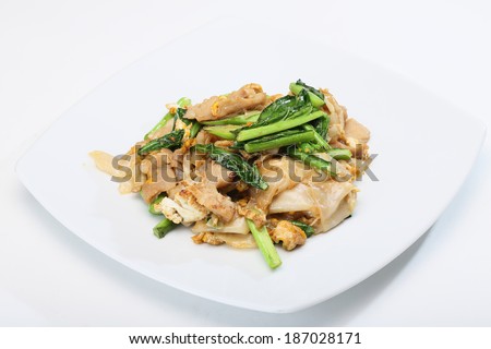 Soy sauce stir-fried noodles served on white dish
