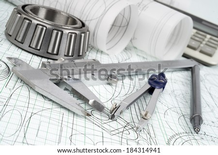 roller bearing, vernier callipers , calculator, compasses, technical pen and drawings