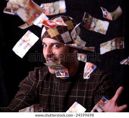 Man Throwing Money Into Air